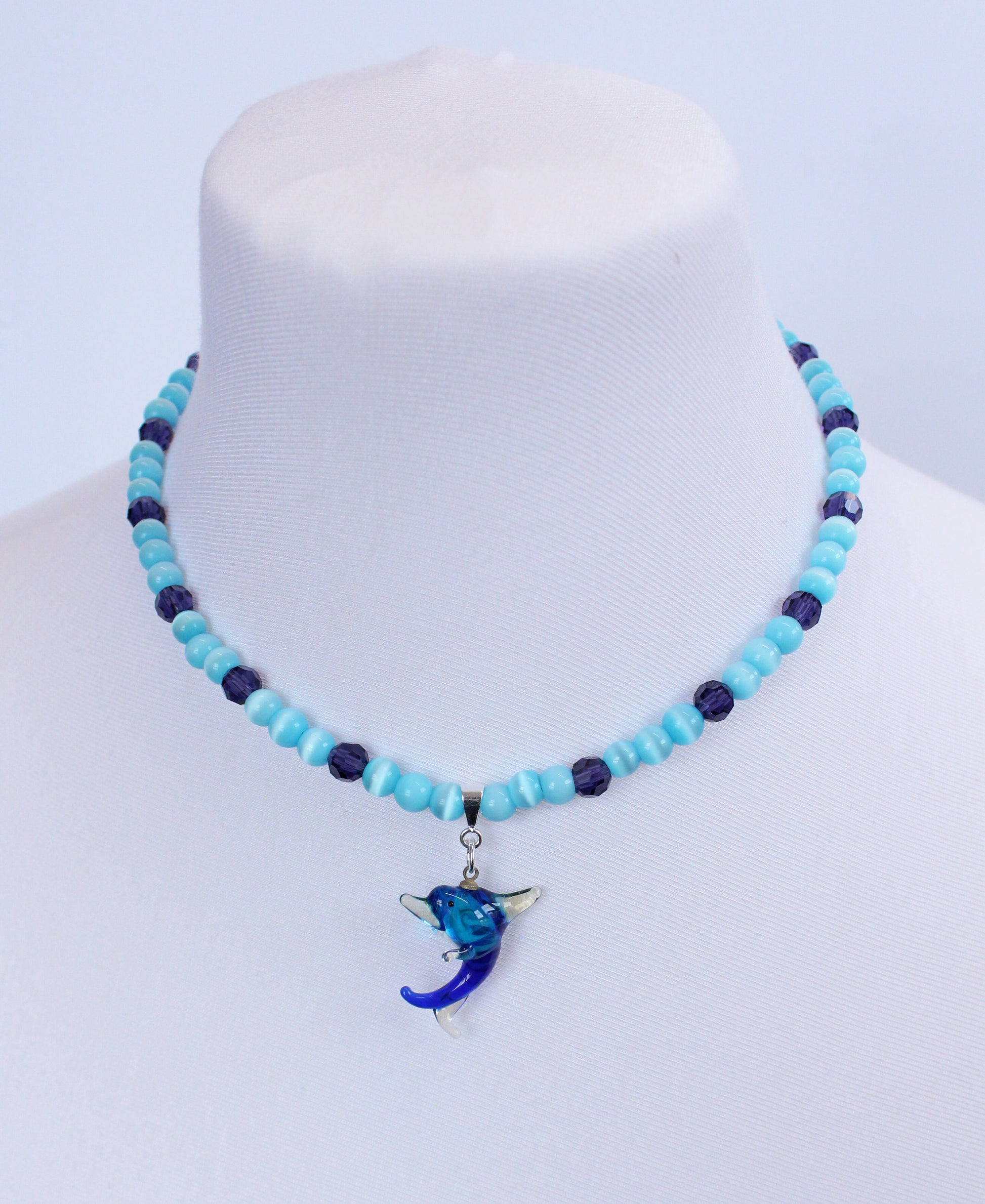 Multi Blue Glass Dolphin Necklace - Bazaare